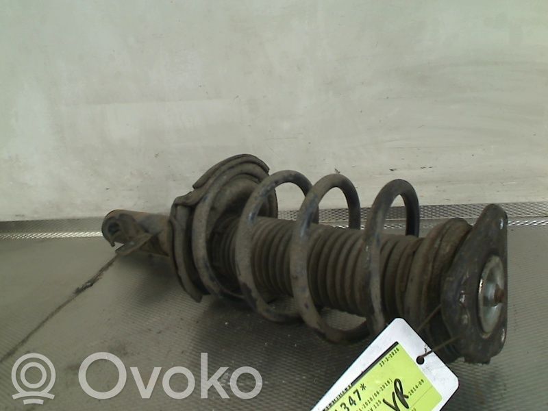 Front shock absorber with coil spring