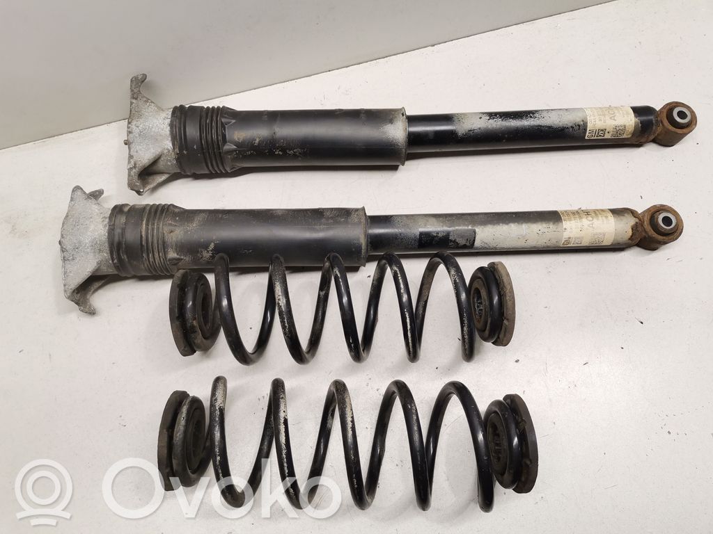 Opel Astra K Amortiguador trasero con muelle espiral 