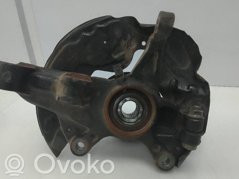 Ford Focus Передний поворотный кулак (ступица, цапфа) 