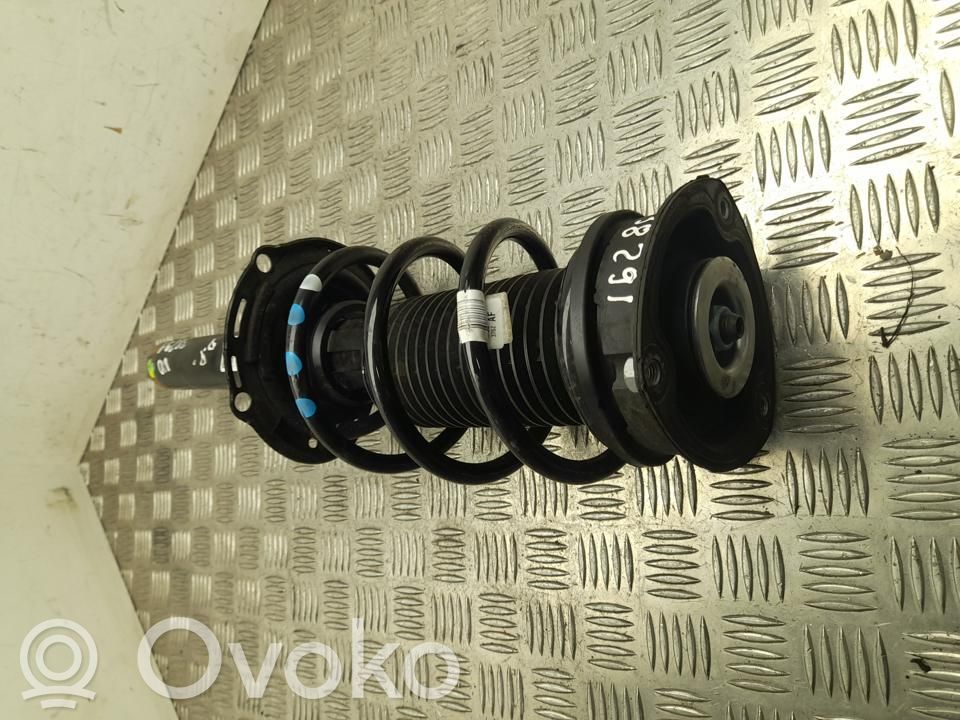 Amortyzator osi przedniej ze sprężyną   2Q0413031EM,VD38291