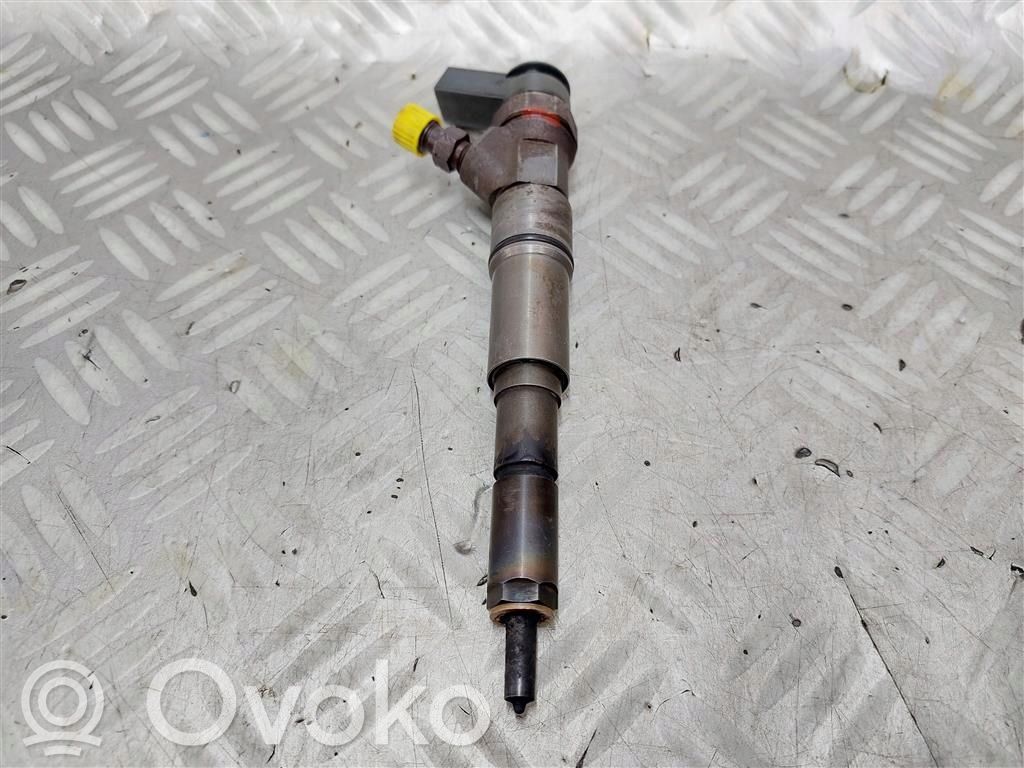 Fuel injector   7788812