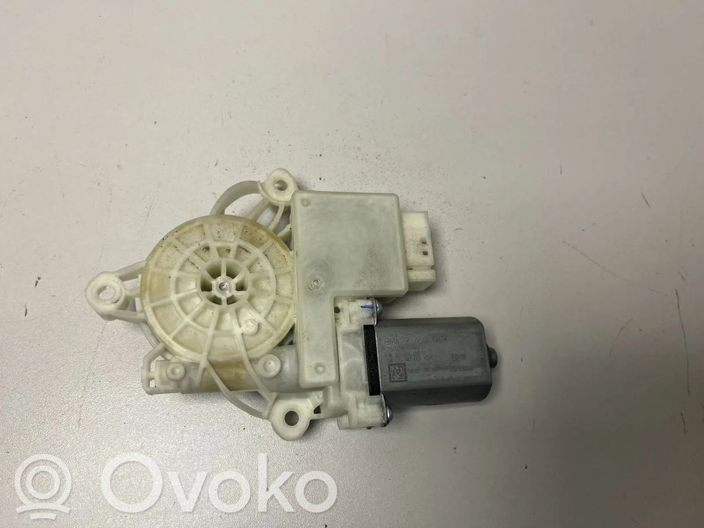 BMW XM Silnik regulatora szyby drzwi przednich 