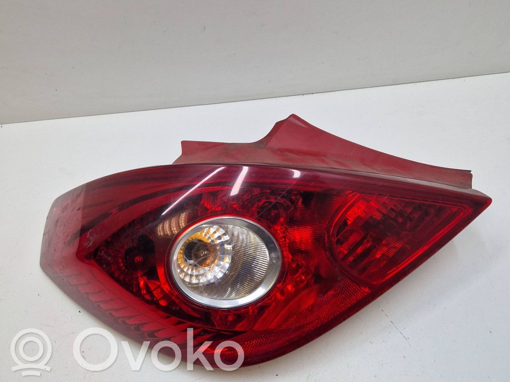Opel Corsa D Aizmugurējais lukturis virsbūvē 