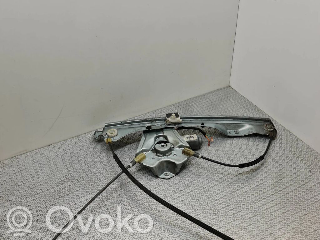 Renault Clio III Elektryczny podnośnik szyby drzwi przednich 