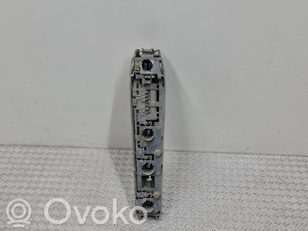 Ford Escort Aizmugures spuldzes vāka turētājs 