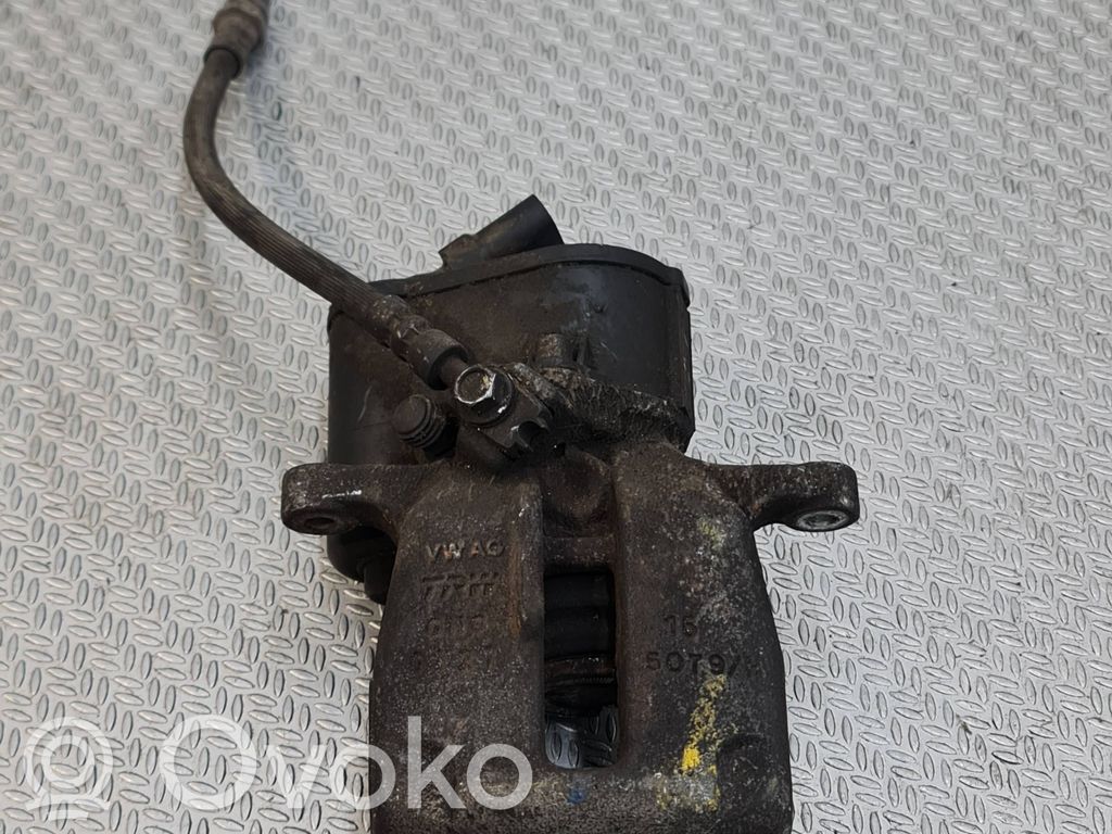 Volkswagen PASSAT B7 Tylny zacisk hamulcowy 