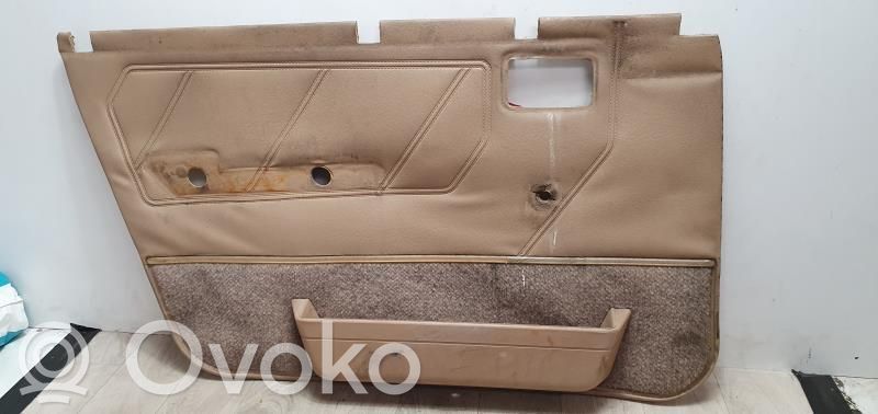 Front door card panel trim