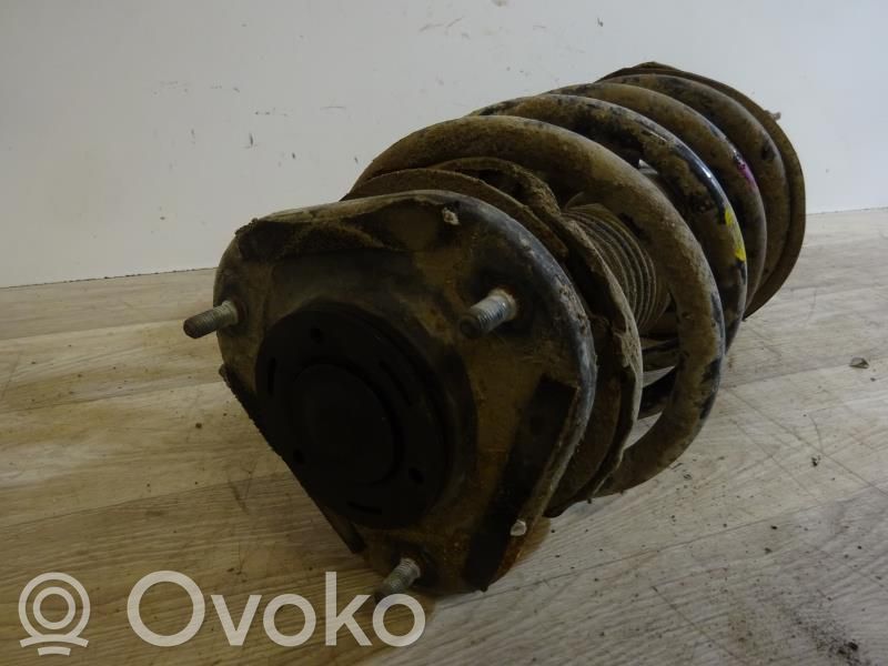 Toyota Corolla E120 E130 Amortiguador delantero con muelle espiral 