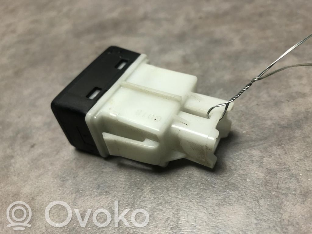 Suzuki Swift I Interruttore di regolazione livello altezza dei fari 