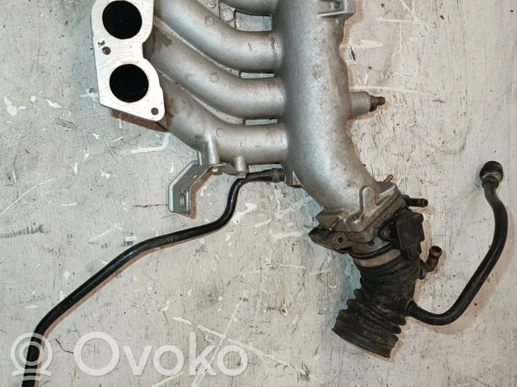 Volvo 460 Colector de admisión 