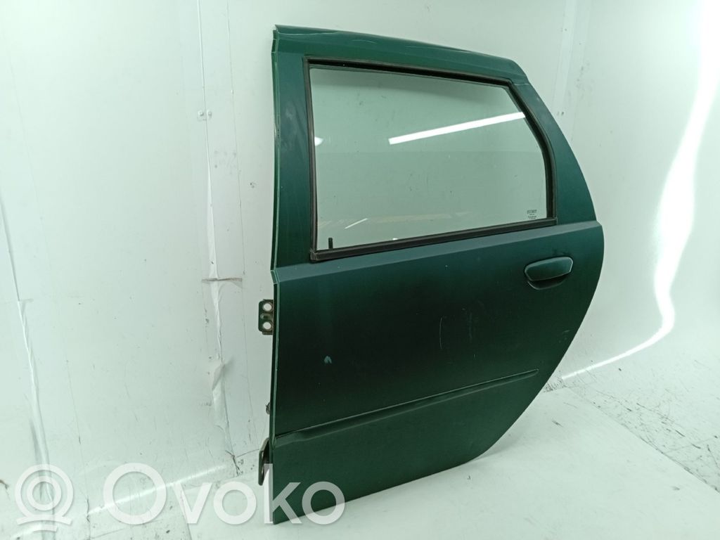 Puerta trasera   COM,ALGUNS,FOTOS,MOSSA,RISCOS