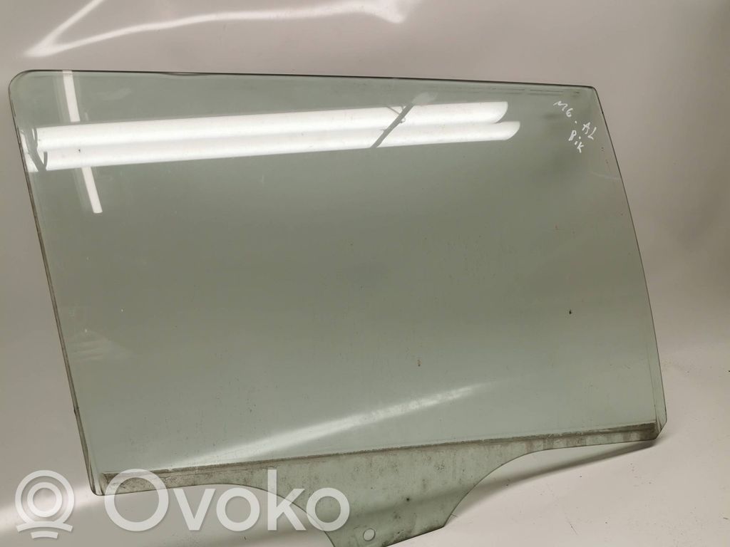 Mazda 6 Rear door window glass 