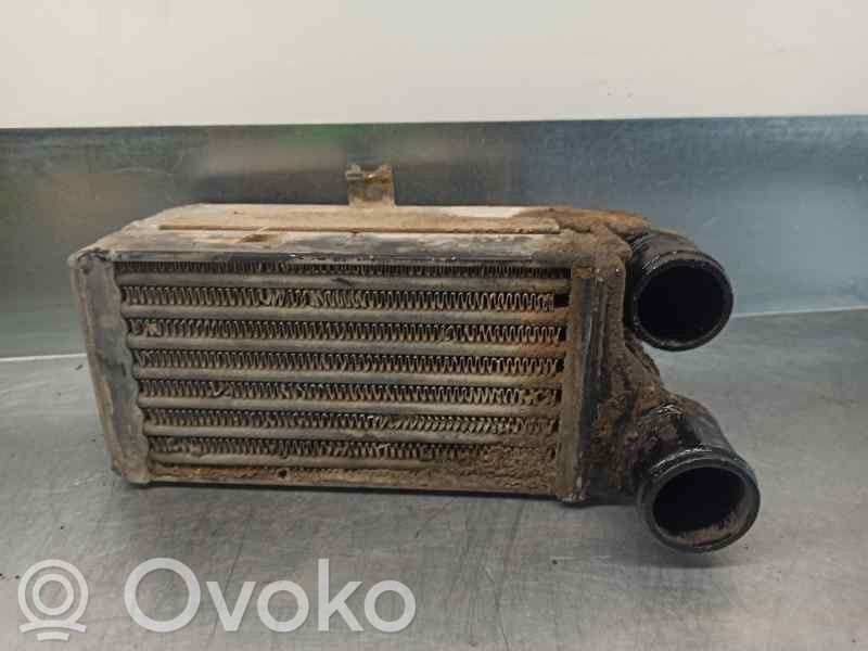 Jeep Cherokee XJ Chłodnica powietrza doładowującego / Intercooler 