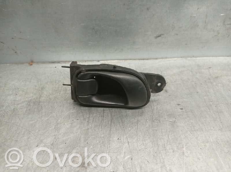 Daewoo Tacuma Manecilla interna puerta delantera 