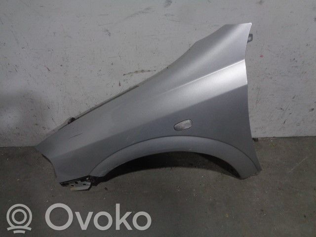 Opel Astra G Błotnik przedni 