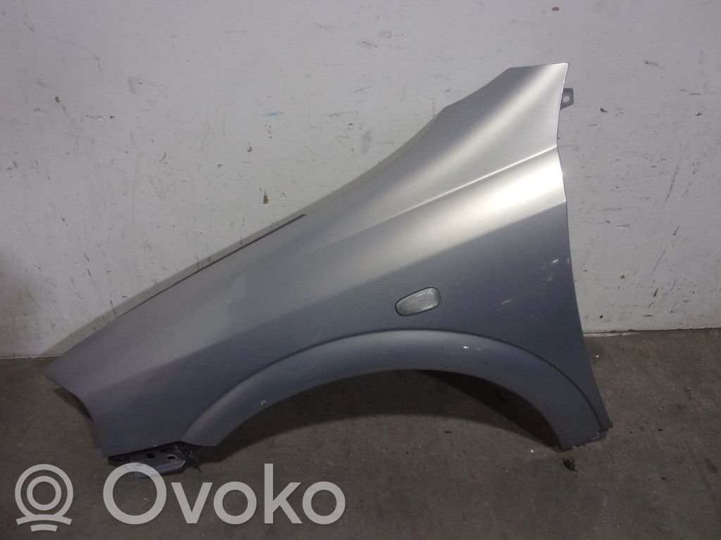Opel Astra G Błotnik przedni 
