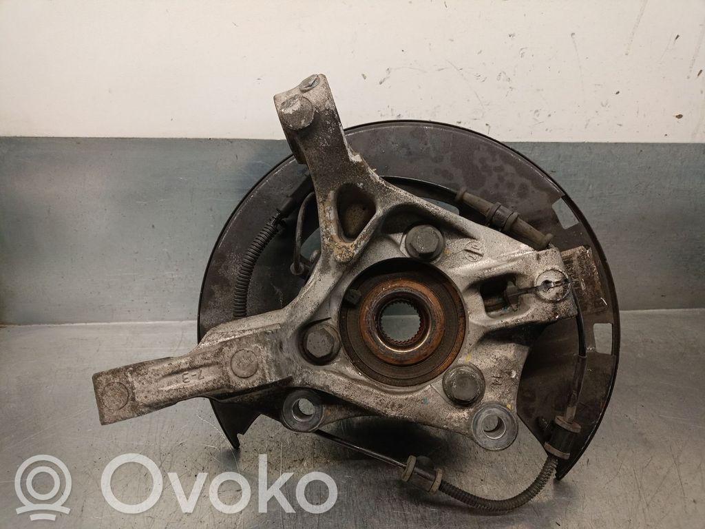 Opel Astra J Zwrotnica koła przedniego 