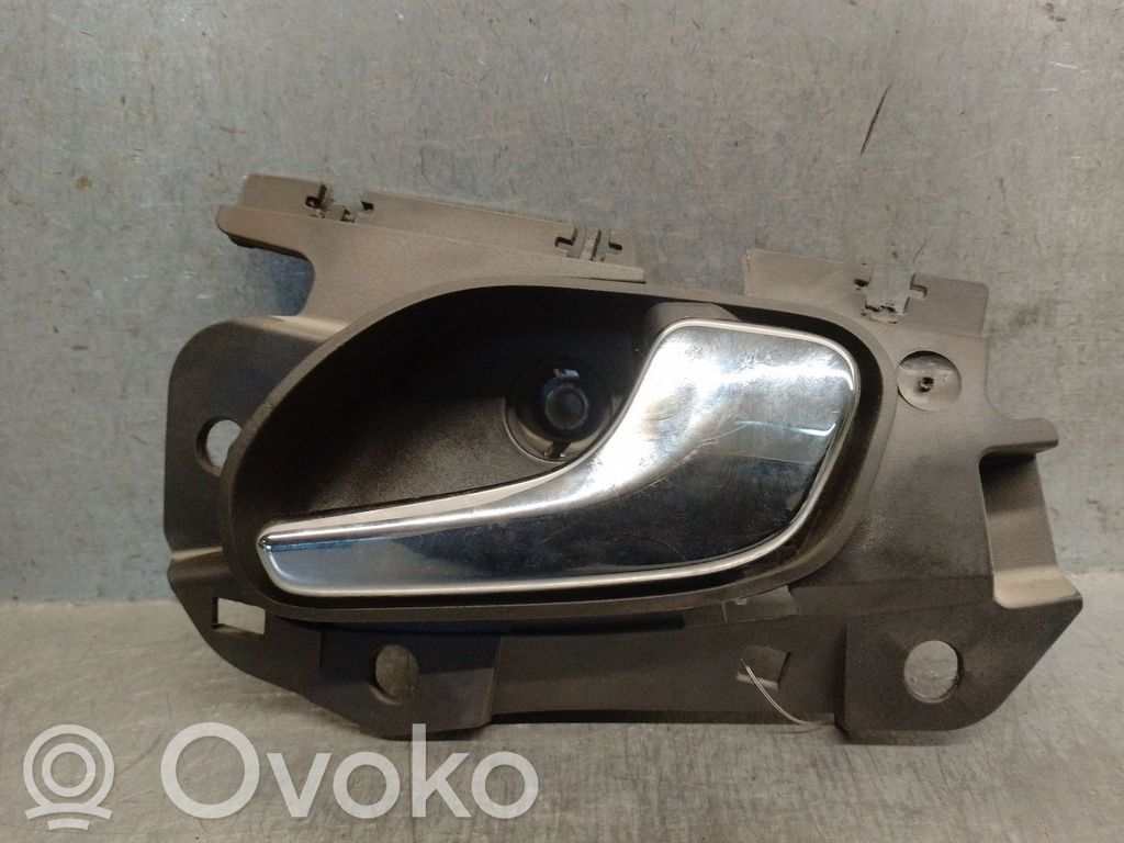 Opel Corsa D Klamka wewnętrzna drzwi tylnych 