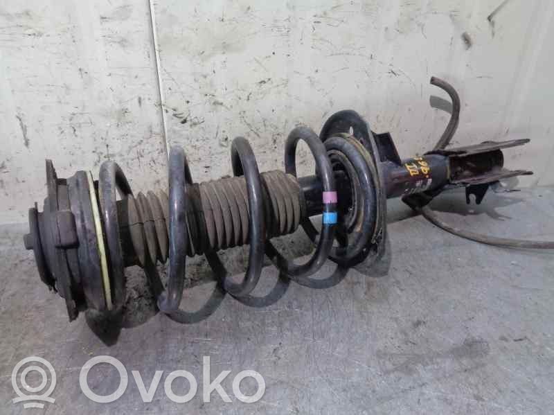 Nissan Qashqai+2 Amortyzator osi przedniej ze sprężyną 