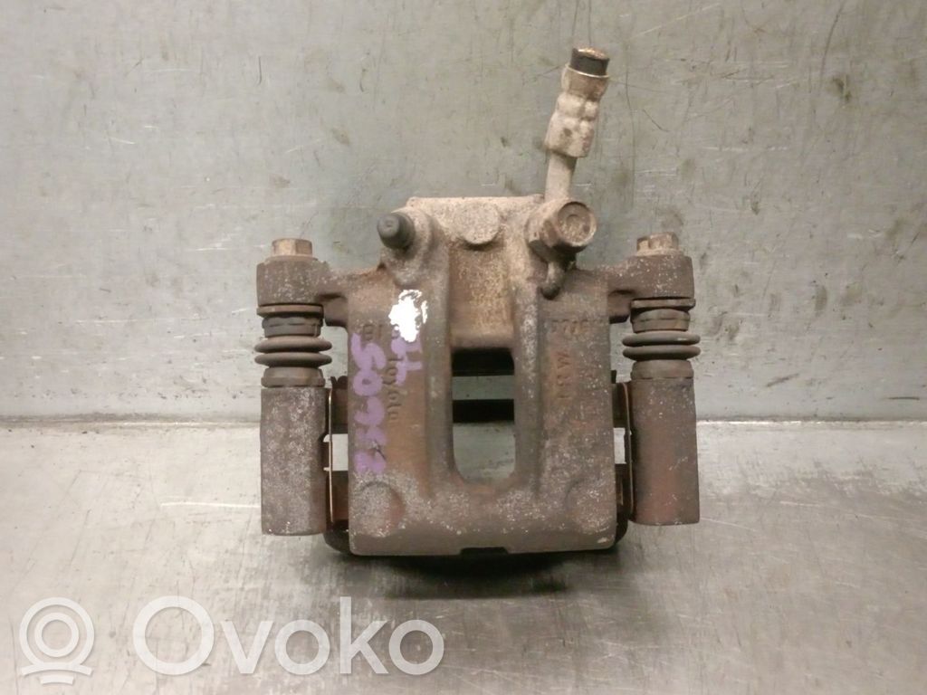 Toyota Corolla E110 Jarrusatulan tyynyn pidike takana 