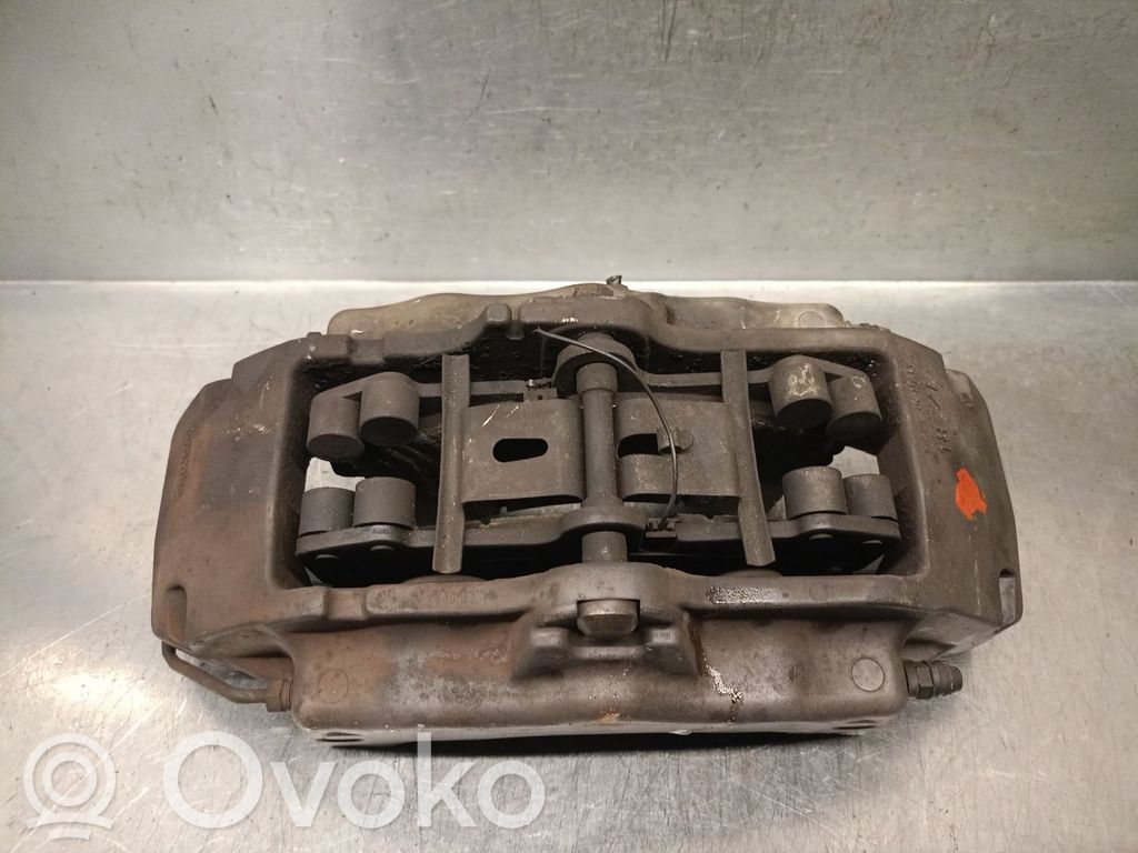 Volkswagen Touareg I Front brake caliper 