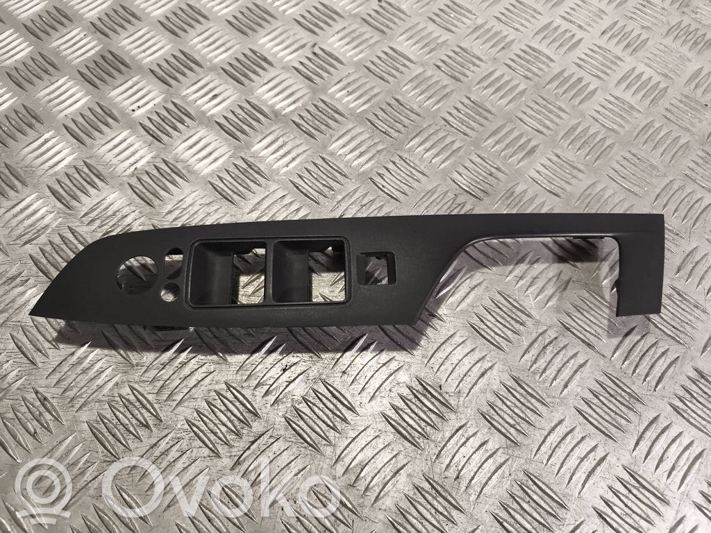 Mazda 6 Front door window switch trim 