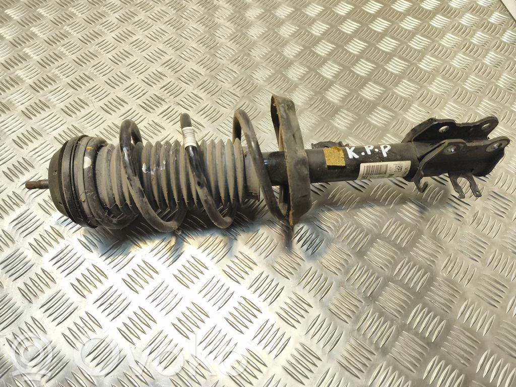 Opel Corsa E Front shock absorber with coil spring 