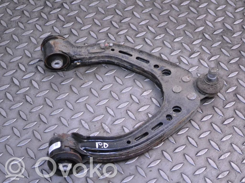 Front upper control arm/wishbone   104396600B