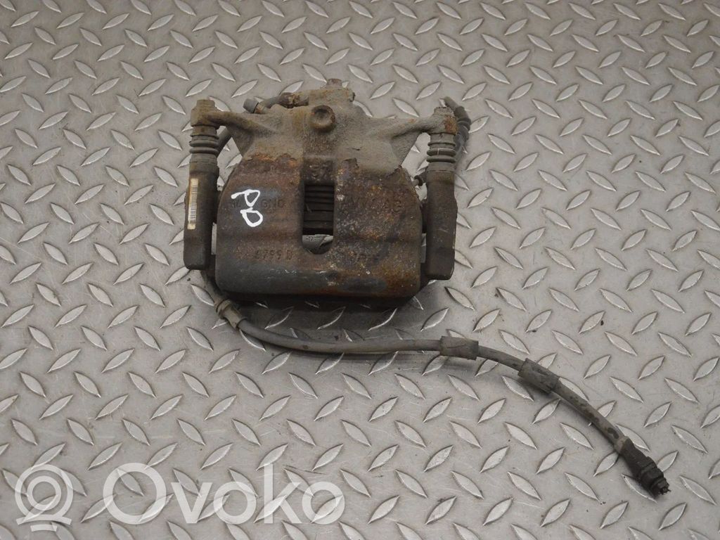 Volkswagen Golf VII Zacisk hamulcowy przedni 