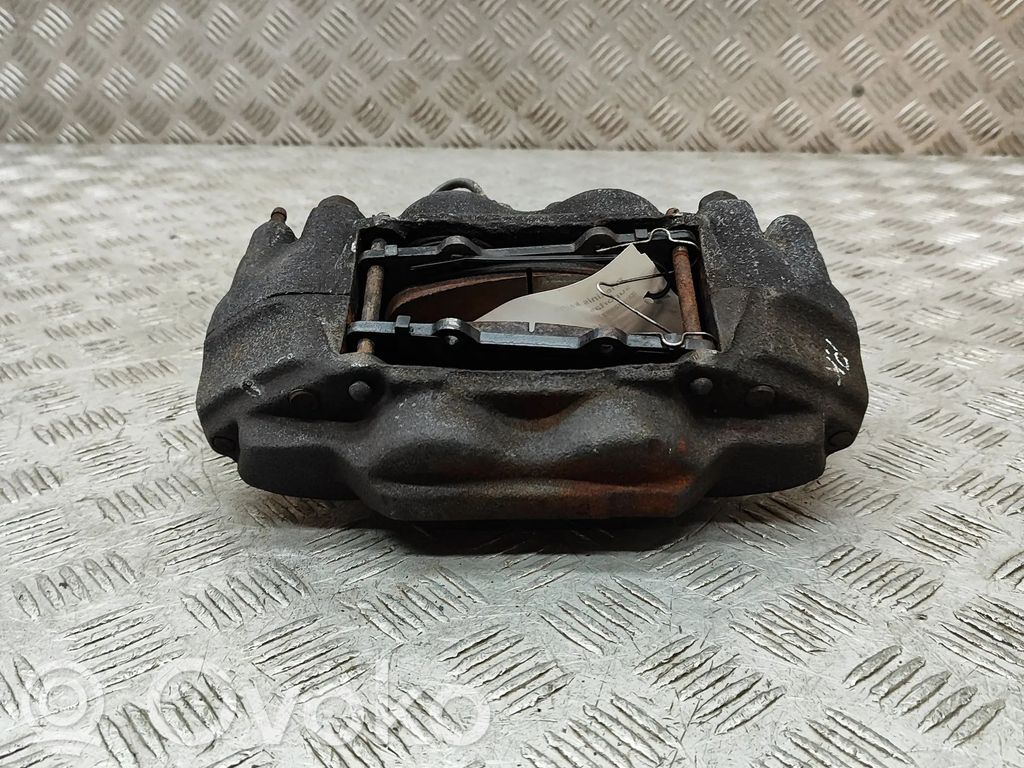Toyota Land Cruiser (J120) Zacisk hamulcowy przedni 