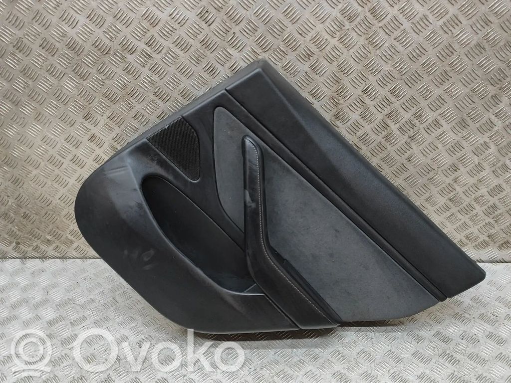 Tesla Model 3 Takaoven verhoilu 