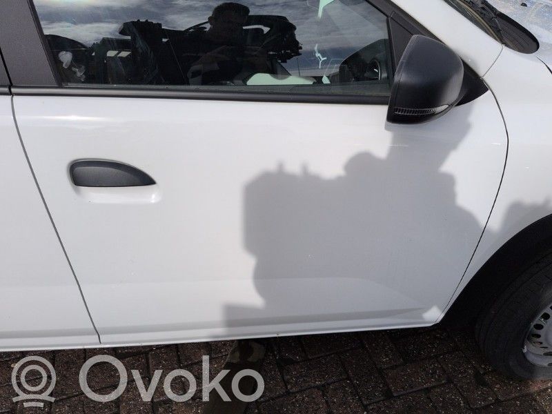 Dacia Spring Puerta delantera 