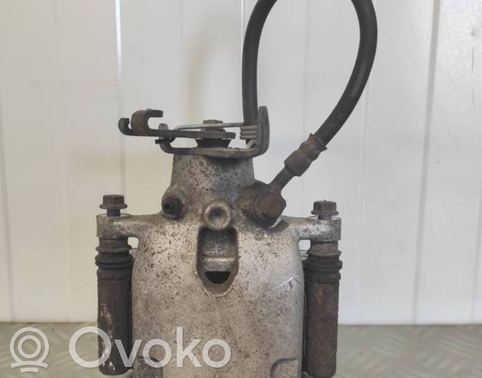 Opel Insignia A Tylny zacisk hamulcowy 
