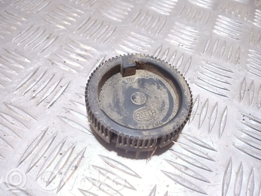 Cache-poussière de phare avant