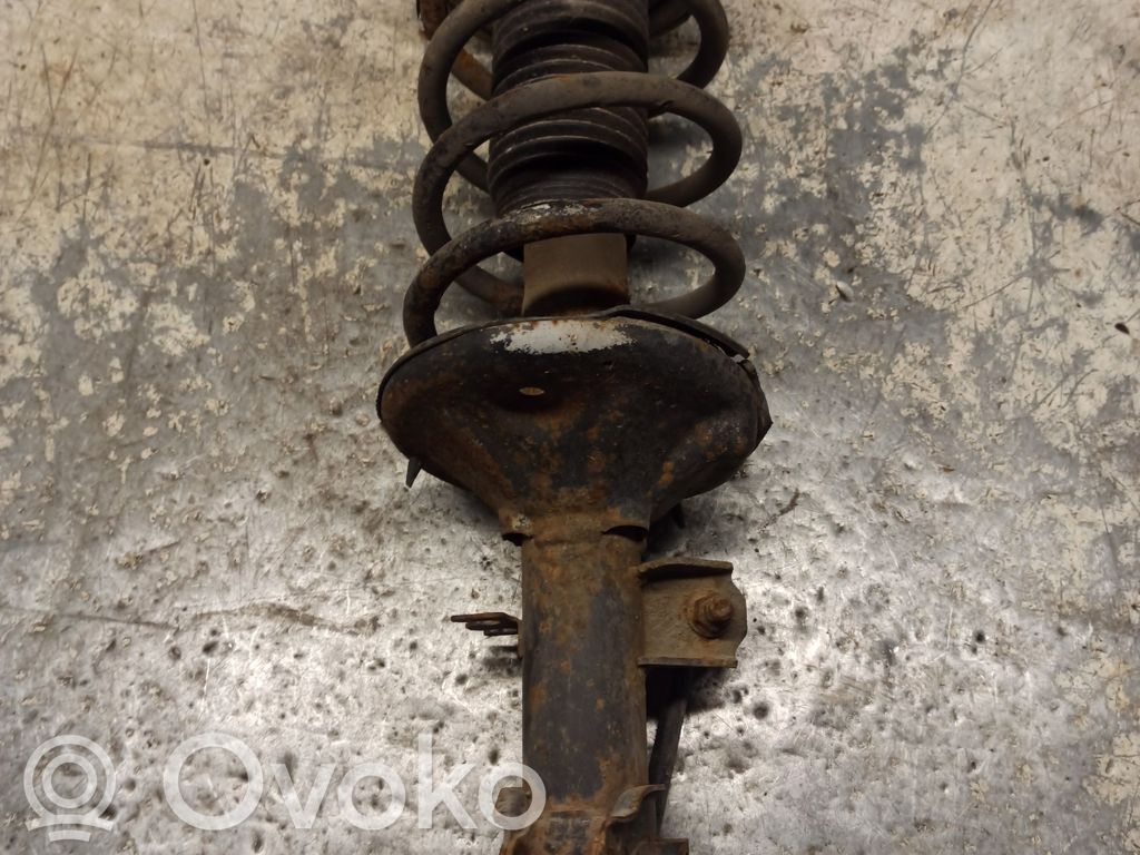 Front shock absorber with coil spring