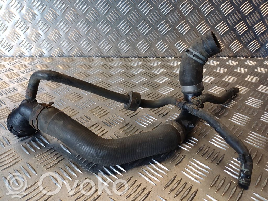 Volkswagen Golf VI Tubo flessibile del liquido di raffreddamento del motore 