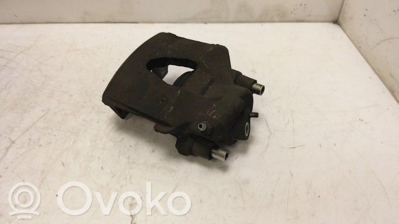 Volkswagen Polo V 6R Zacisk hamulcowy przedni 
