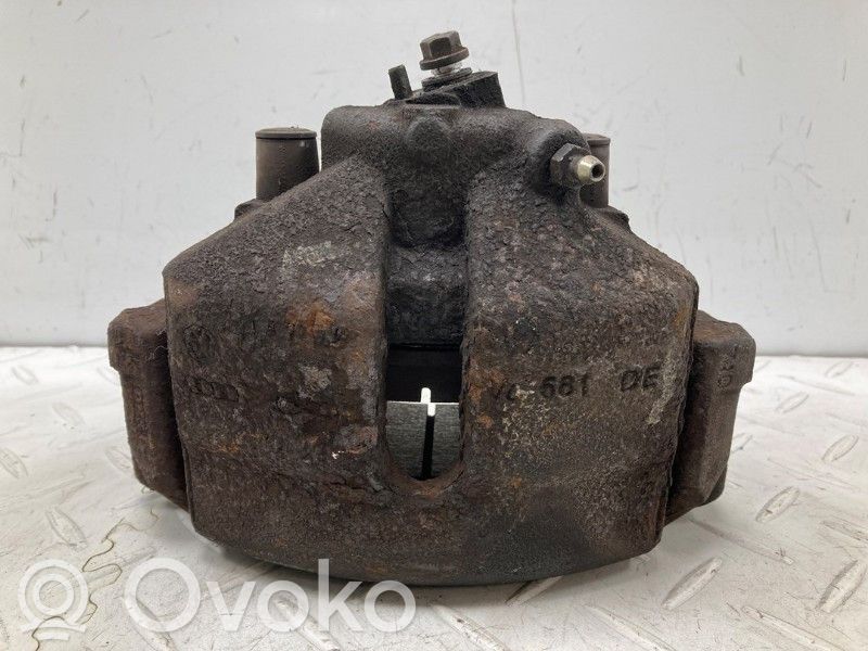 Volkswagen Golf V Zacisk hamulcowy przedni