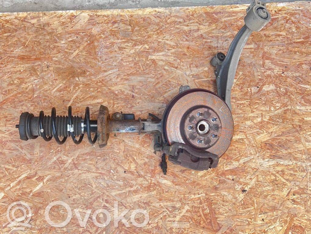 Opel Astra J Zwrotnica koła przedniego 