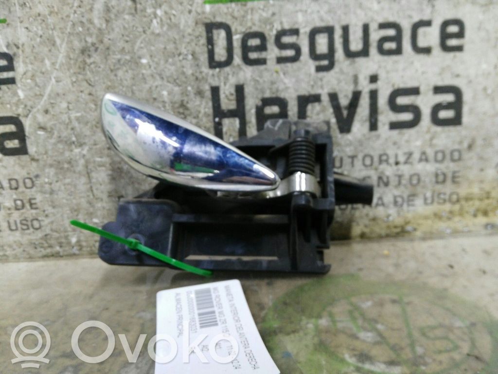 Manecilla interna puerta delantera