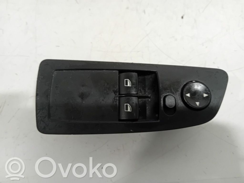 Electric window control switch   6952806