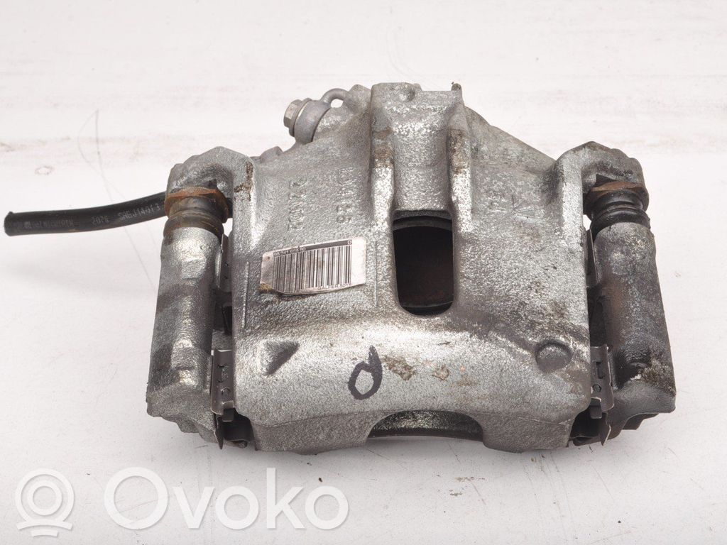 Opel Corsa F Zacisk hamulcowy przedni 