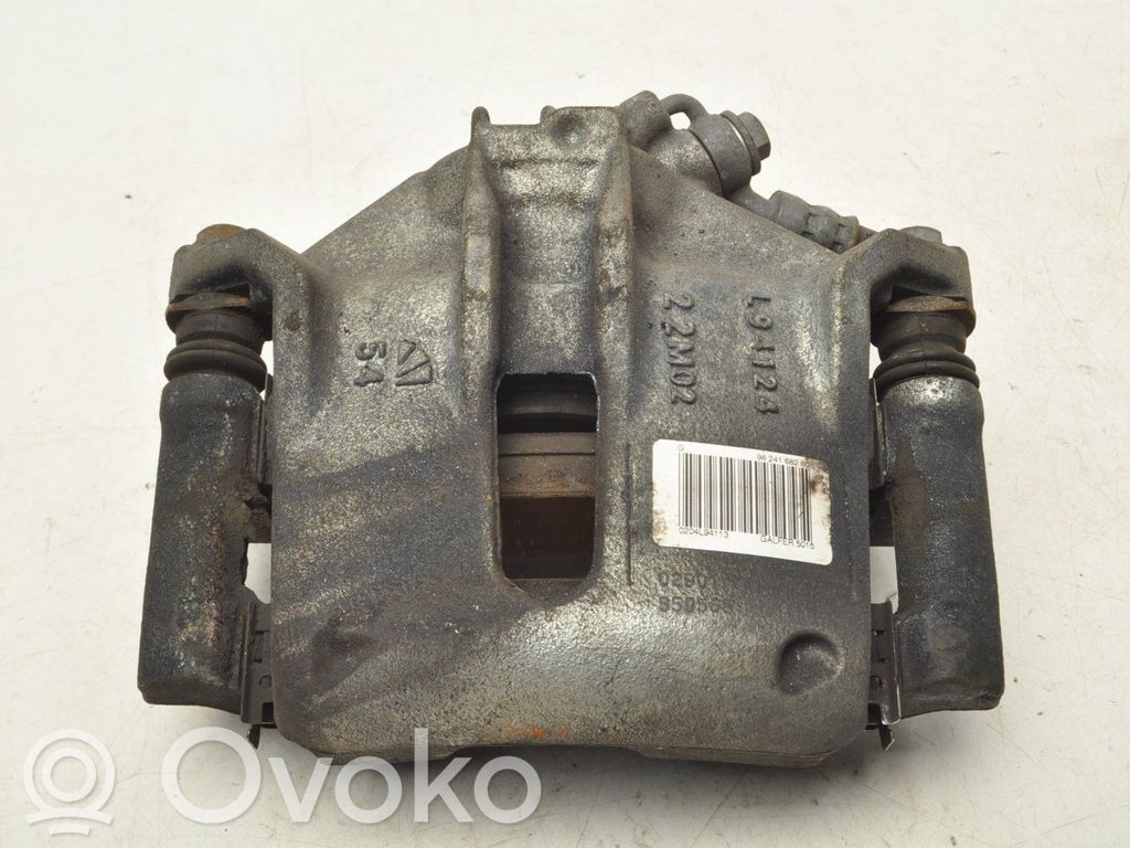 Opel Corsa F Zacisk hamulcowy przedni 