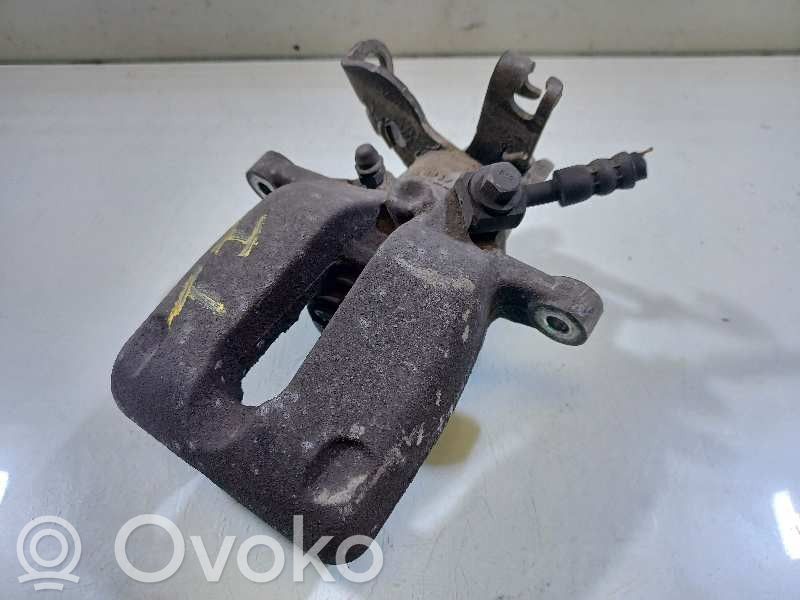 Opel Insignia A Tylny zacisk hamulcowy 