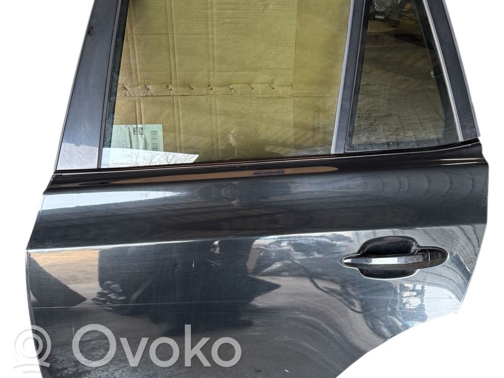 BMW X3 E83 Aizmugurējās durvis 