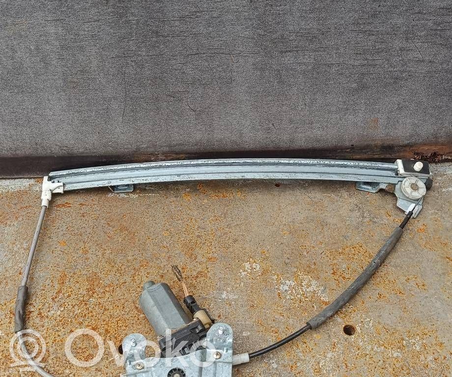 Renault Megane I Elektryczny podnośnik szyby drzwi przednich 