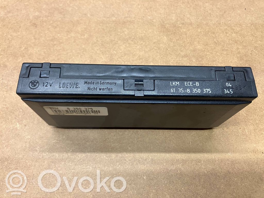 BMW 5 E34 Komforto modulis 