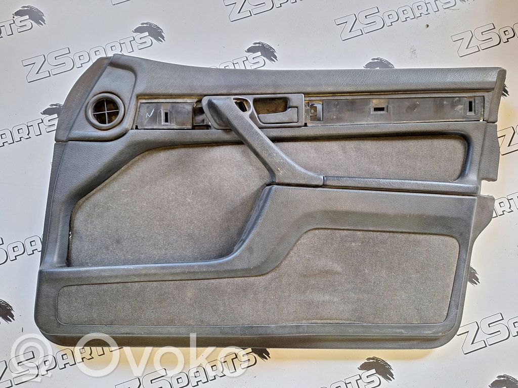 Front door card panel trim