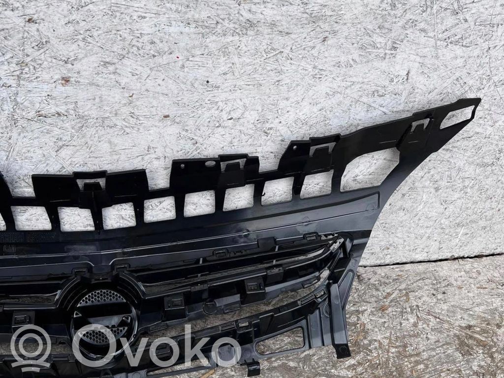 Opel Astra J Maskownica / Grill / Atrapa górna chłodnicy 