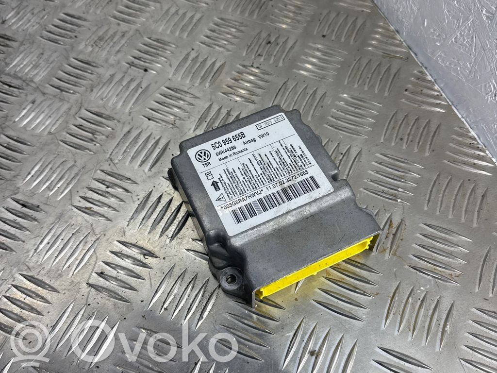 Volkswagen Golf VI Airbag control unit/module 